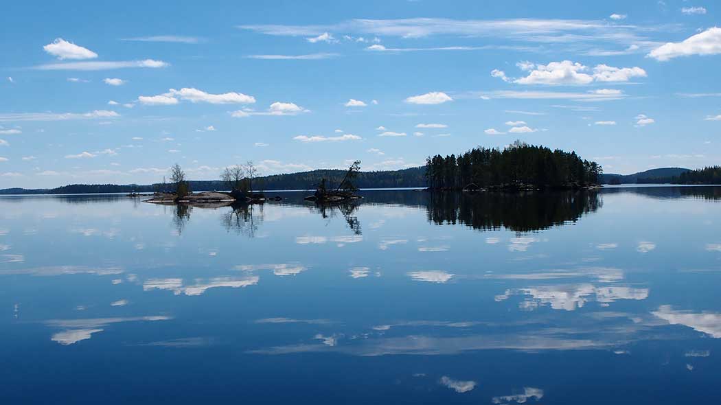 Lake. Behind small islands.