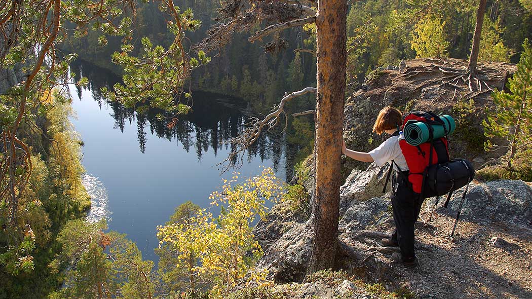 Hiker standing on the cliff.