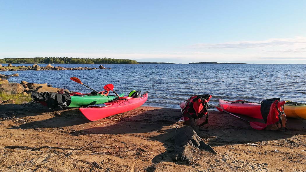 Kayaks in the summer by the sea.